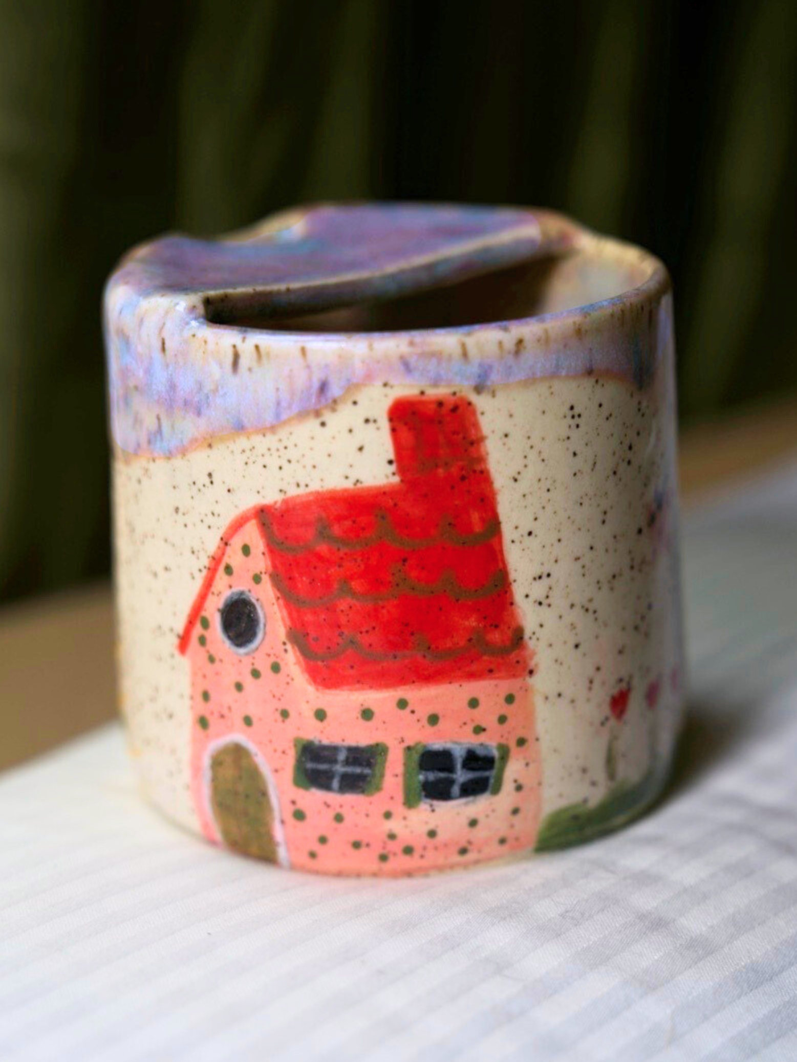 Ceramic travel mug with a red house design cottage home drawing